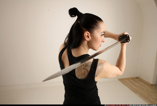 Woman Adult Athletic White Fighting with sword Standing poses Casual