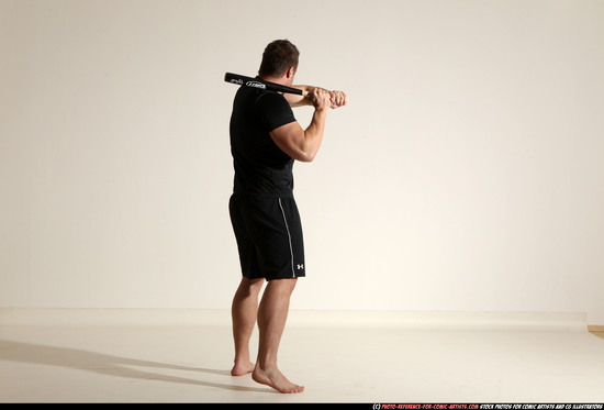 Adult Muscular White Moving poses Sportswear Fighting with bat