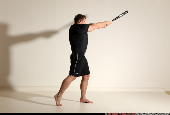 Adult Muscular White Moving poses Sportswear Fighting with bat