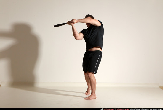 Adult Muscular White Moving poses Sportswear Fighting with bat