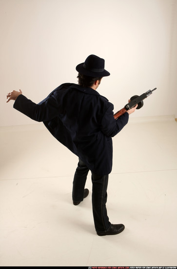 Man Old Average White Fighting with gun Standing poses Coat