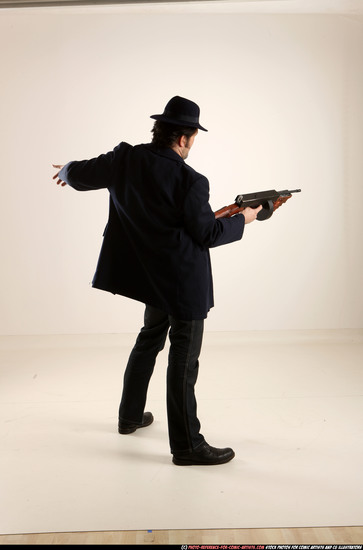 Man Old Average White Fighting with gun Standing poses Coat