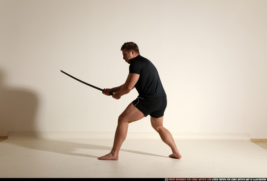 Man Adult Muscular White Fighting with sword Moving poses Sportswear