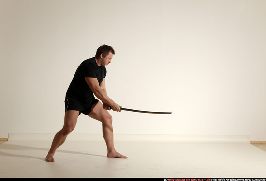 Man Adult Muscular White Fighting with sword Moving poses Sportswear