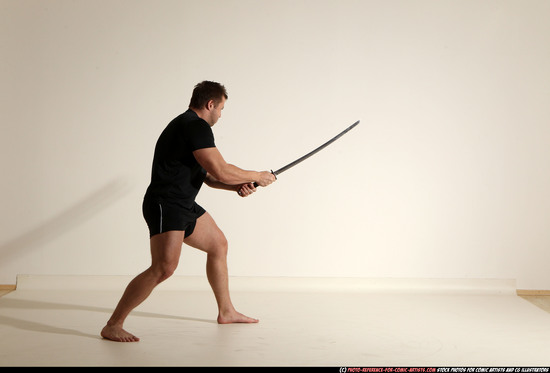 Man Adult Muscular White Fighting with sword Moving poses Sportswear