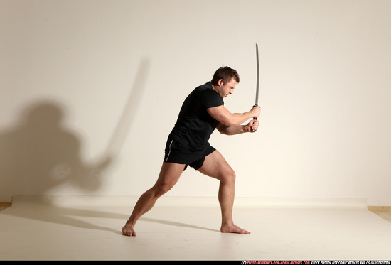 Man Adult Muscular White Fighting with sword Moving poses Sportswear