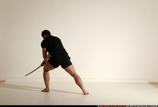 Man Adult Muscular White Fighting with sword Moving poses Sportswear