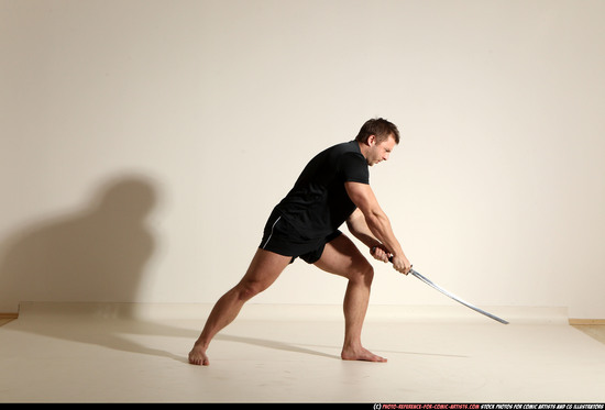 Man Adult Muscular White Fighting with sword Moving poses Sportswear