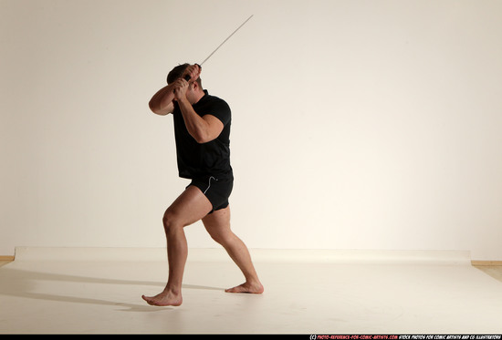 Man Adult Muscular White Fighting with sword Moving poses Sportswear