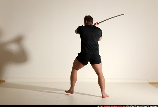 Man Adult Muscular White Fighting with sword Moving poses Sportswear