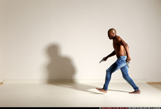 Man Adult Athletic Black Fighting with gun Moving poses Pants