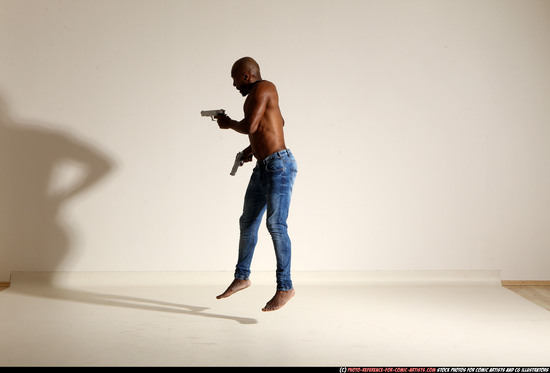 Man Adult Athletic Black Fighting with gun Moving poses Pants