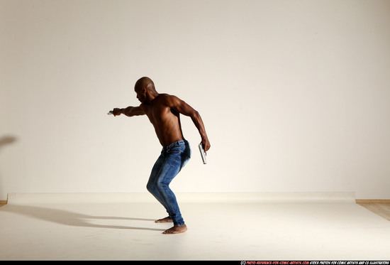 Man Adult Athletic Black Fighting with gun Moving poses Pants