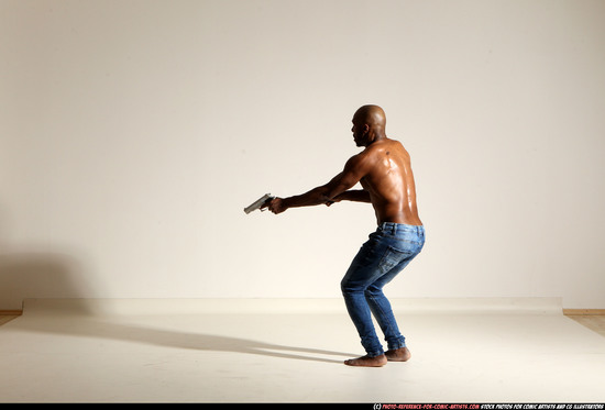 Man Adult Athletic Black Fighting with gun Moving poses Pants