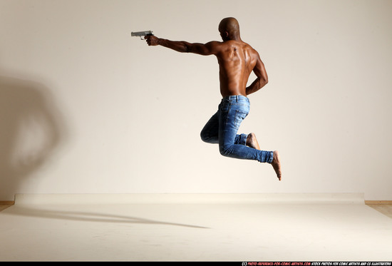 Man Adult Athletic Black Fighting with gun Moving poses Pants