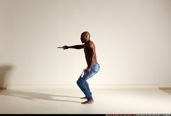 Man Adult Athletic Black Fighting with gun Moving poses Pants