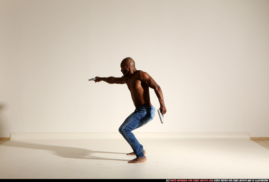 Man Adult Athletic Black Fighting with gun Moving poses Pants