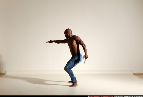 Man Adult Athletic Black Fighting with gun Moving poses Pants