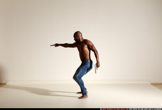 Man Adult Athletic Black Fighting with gun Moving poses Pants