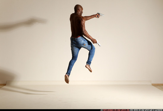 Man Adult Athletic Black Fighting with gun Moving poses Pants