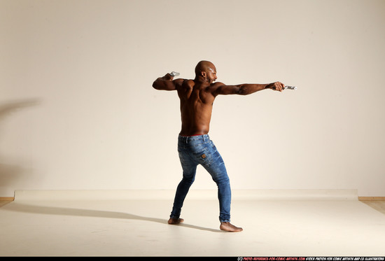 Man Adult Athletic Black Fighting with gun Moving poses Pants