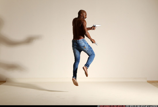 Man Adult Athletic Black Fighting with gun Moving poses Pants