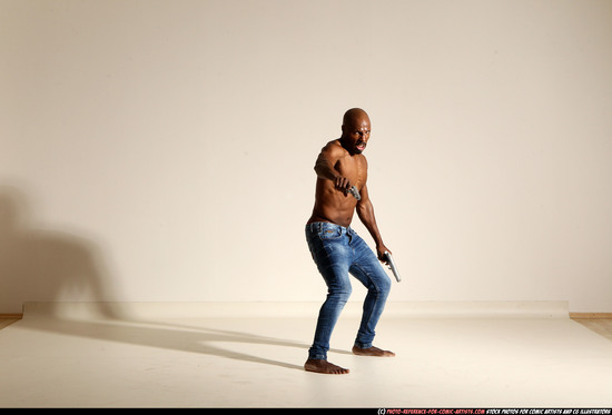 Man Adult Athletic Black Fighting with gun Moving poses Pants