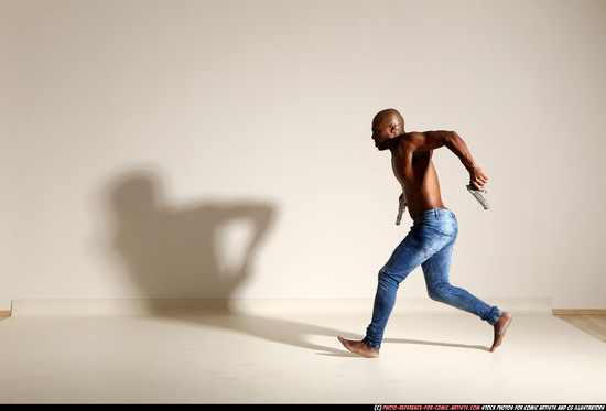 Man Adult Athletic Black Fighting with gun Moving poses Pants