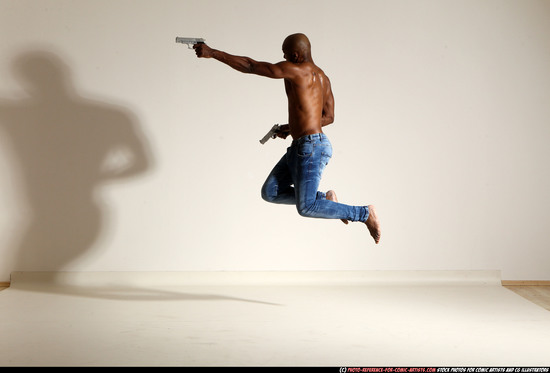 Man Adult Athletic Black Fighting with gun Moving poses Pants