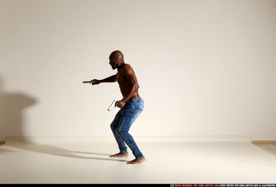 Man Adult Athletic Black Fighting with gun Moving poses Pants