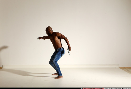 Man Adult Athletic Black Fighting with gun Moving poses Pants