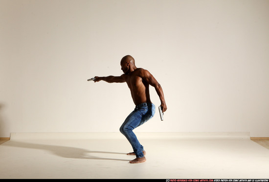 Man Adult Athletic Black Fighting with gun Moving poses Pants