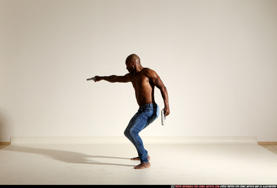 Man Adult Athletic Black Fighting with gun Moving poses Pants