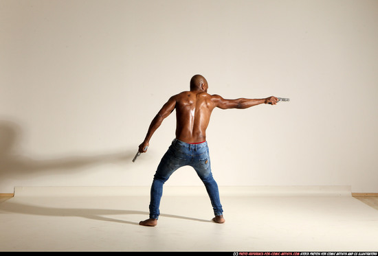 Man Adult Athletic Black Fighting with gun Moving poses Pants