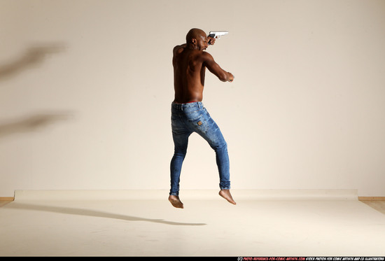 Man Adult Athletic Black Fighting with gun Moving poses Pants