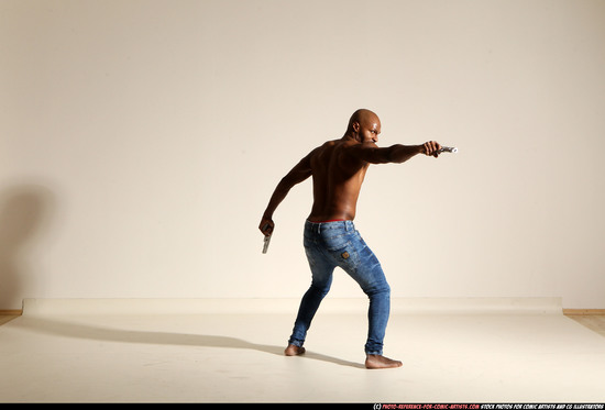 Man Adult Athletic Black Fighting with gun Moving poses Pants