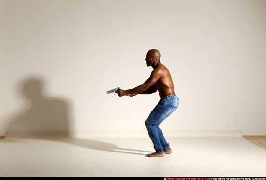 Man Adult Athletic Black Fighting with gun Moving poses Pants