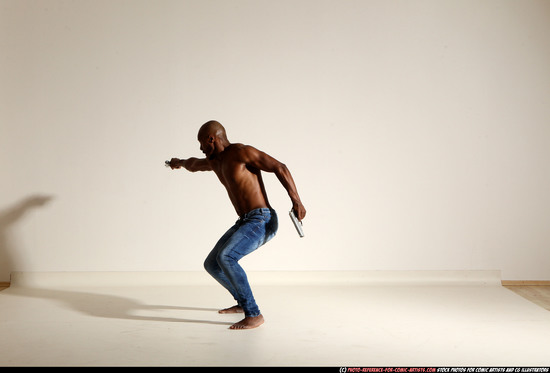 Man Adult Athletic Black Fighting with gun Moving poses Pants