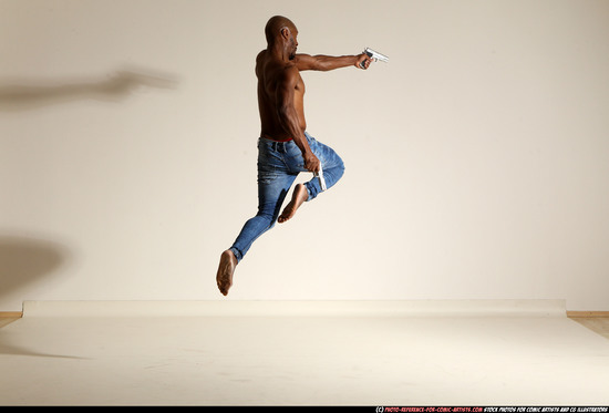 Man Adult Athletic Black Fighting with gun Moving poses Pants