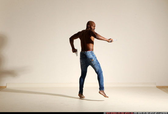 Man Adult Athletic Black Fighting with gun Moving poses Pants