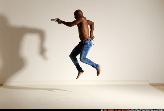 Man Adult Athletic Black Fighting with gun Moving poses Pants