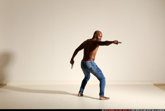 Man Adult Athletic Black Fighting with gun Moving poses Pants