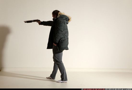 Man Adult Muscular White Fighting with gun Standing poses Casual