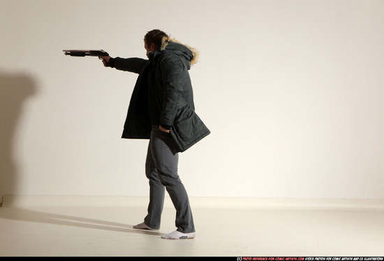 Man Adult Muscular White Fighting with gun Standing poses Casual