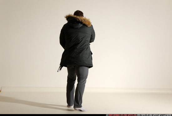 Man Adult Muscular White Fighting with gun Standing poses Casual