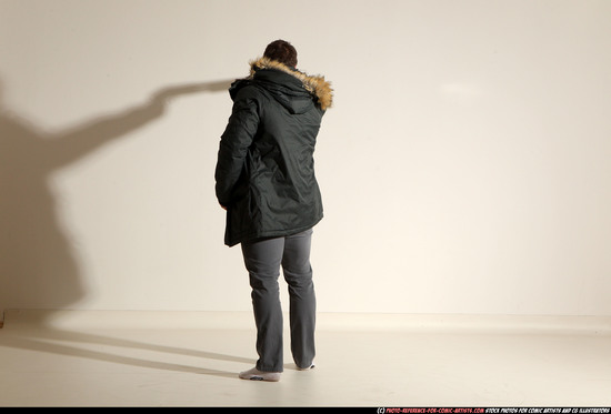 Man Adult Muscular White Fighting with gun Standing poses Casual