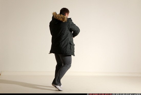 Man Adult Muscular White Fighting with gun Standing poses Casual