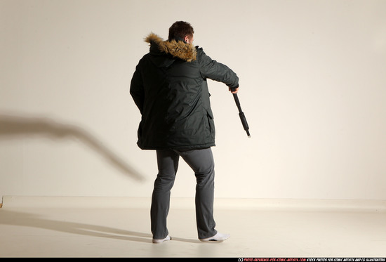 Man Adult Muscular White Fighting with gun Standing poses Casual