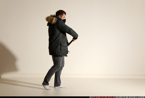 Man Adult Muscular White Fighting with gun Standing poses Casual