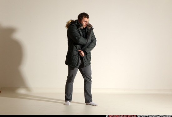 Man Adult Muscular White Fighting with gun Standing poses Casual